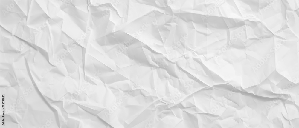 Crumpled, crinkled white office paper. Sharp textures and contrast. Graphic resource background and wallpaper. Crumpled, crinkled white office paper. Sharp textures and contrast. Graphic resource background and wallpaper.