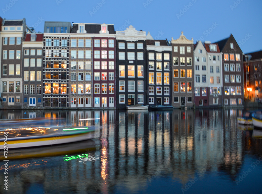 Boat and buildings high exposure reflection on an Amsterdam, Holland, The Netherlands