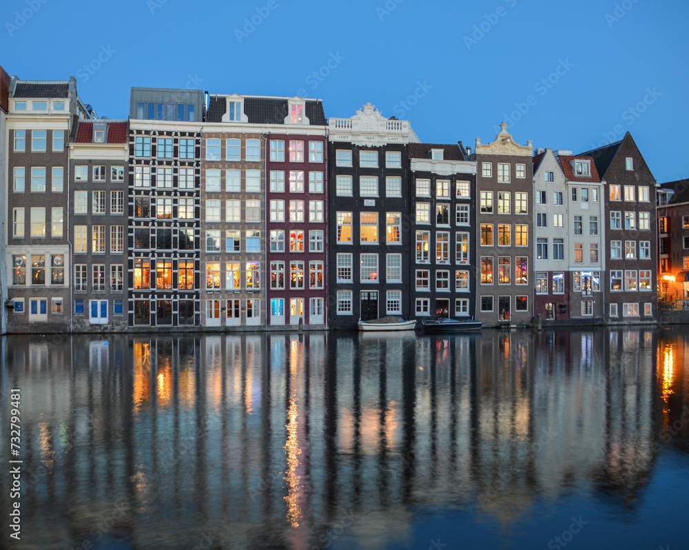 Buildings reflections on canal at Amsterdam, Holland, The Netherlands