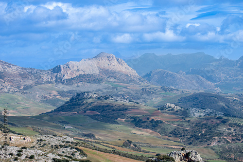 Panoramic view from road to Antequerra National Park, limestone rock formations and known for unusual karst landforms in Andalusia, Malaga, Spain.