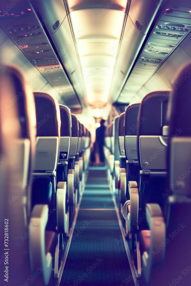 Obraz premium Interior of a commercial airplane with empty seats, shallow depth of field