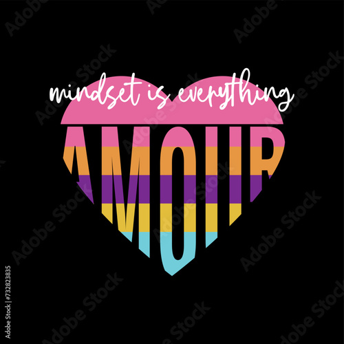 Mindset is everything love. Written in white cursive and the word "amour" is colored in the shape of a heart. black background.