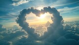 Clouds in the shape of a heart and a bright sun in a blue sky. Concept of love and happiness
