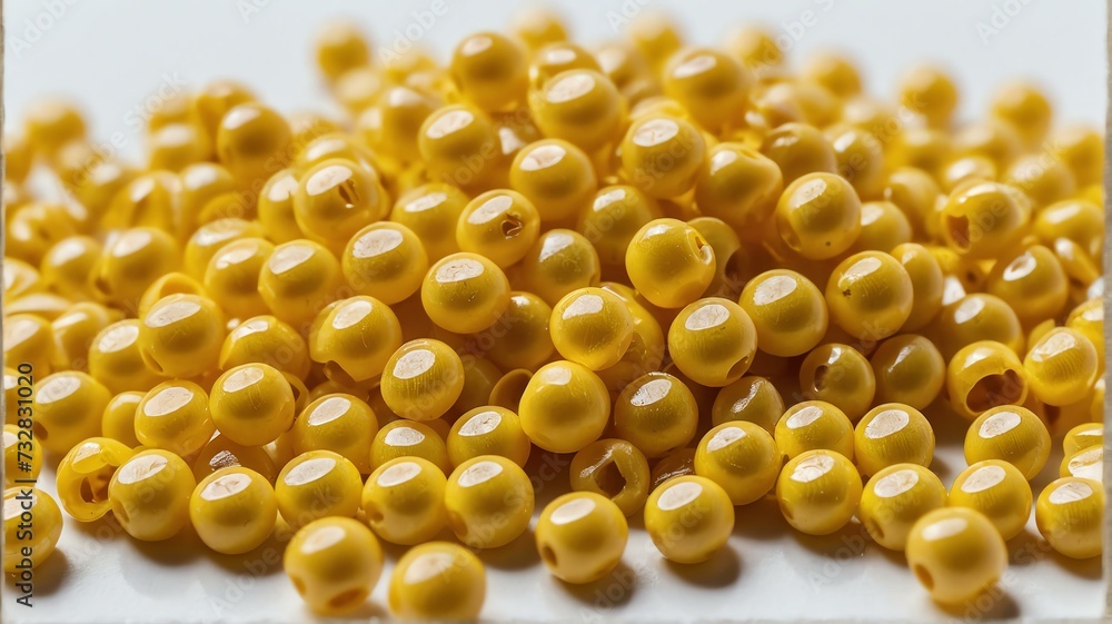 Polypropylene polyamide yellow plastic pellets on plain white background from Generative AI Polypropylene polyamide yellow plastic pellets on plain white background from Generative AI