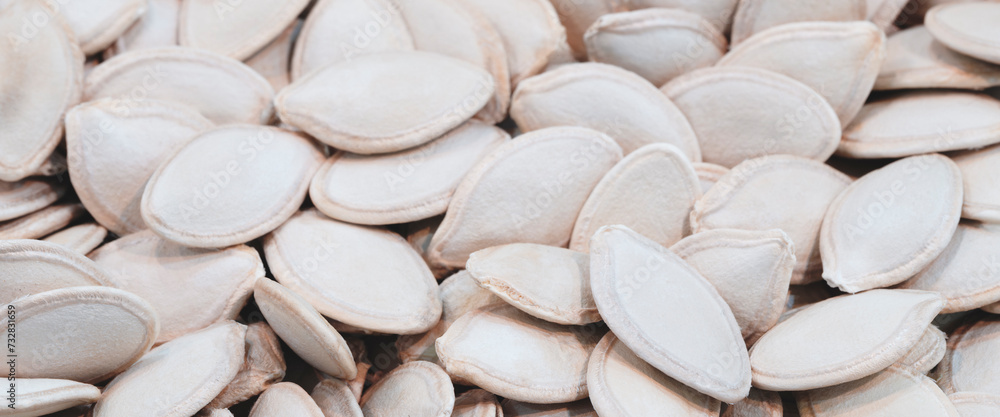 pumpkin seeds background. Top view. Flat lay. Texture element for package and marketing materials design pumpkin seeds background. Top view. Flat lay. Texture element for package and marketing materials design