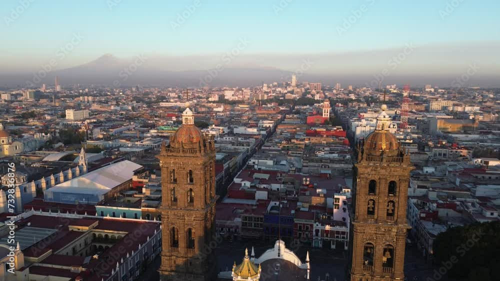A drone flight over Puebla's Cathedral in Mexico with background the volcanos Iztaccihuatl and Popocatepetl, ladies first. A drone flight over Puebla's Cathedral in Mexico with background the volcanos Iztaccihuatl and Popocatepetl, ladies first.