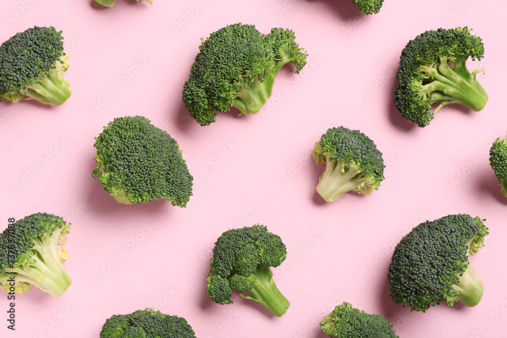 Fresh green broccoli on pink background