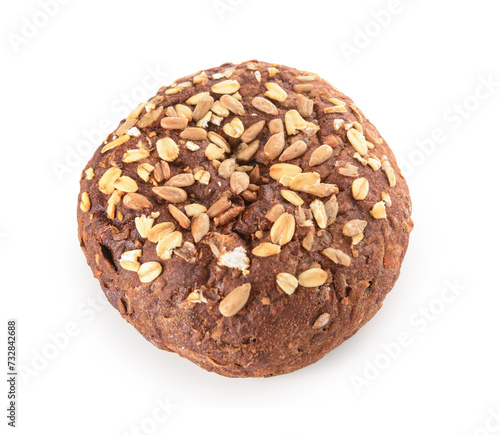 Fresh whole grain bun with seeds on white background