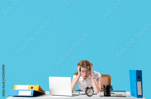 Stressed young businesswoma...