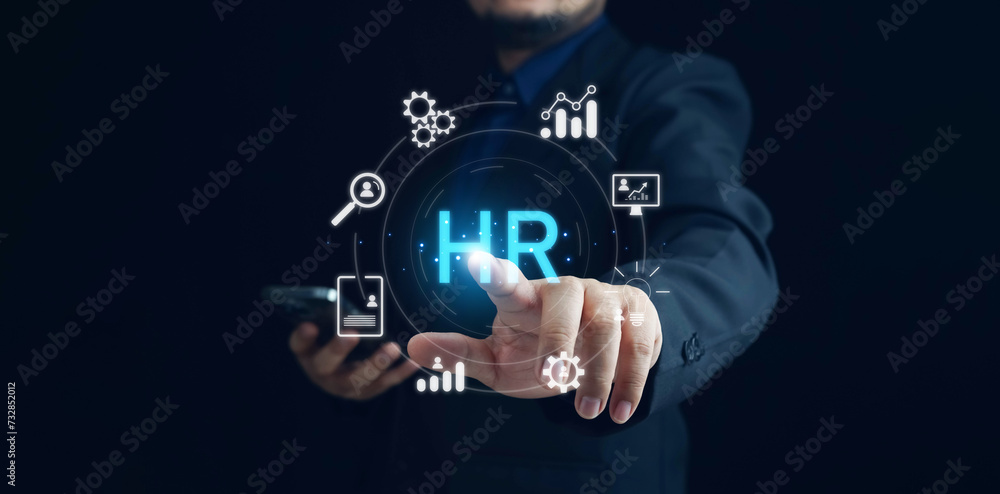HR management, Human resources management concept, Technology and network concept. CRM, HR word button. Businessman presses hr icon on virtual screen on background of network business success sign. HR management, Human resources management concept, Technology and network concept. CRM, HR word button. Businessman presses hr icon on virtual screen on background of network business success sign.