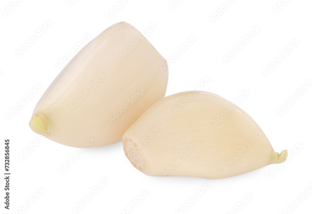 Peeled cloves of fresh garlic isolated on white Peeled cloves of fresh garlic isolated on white