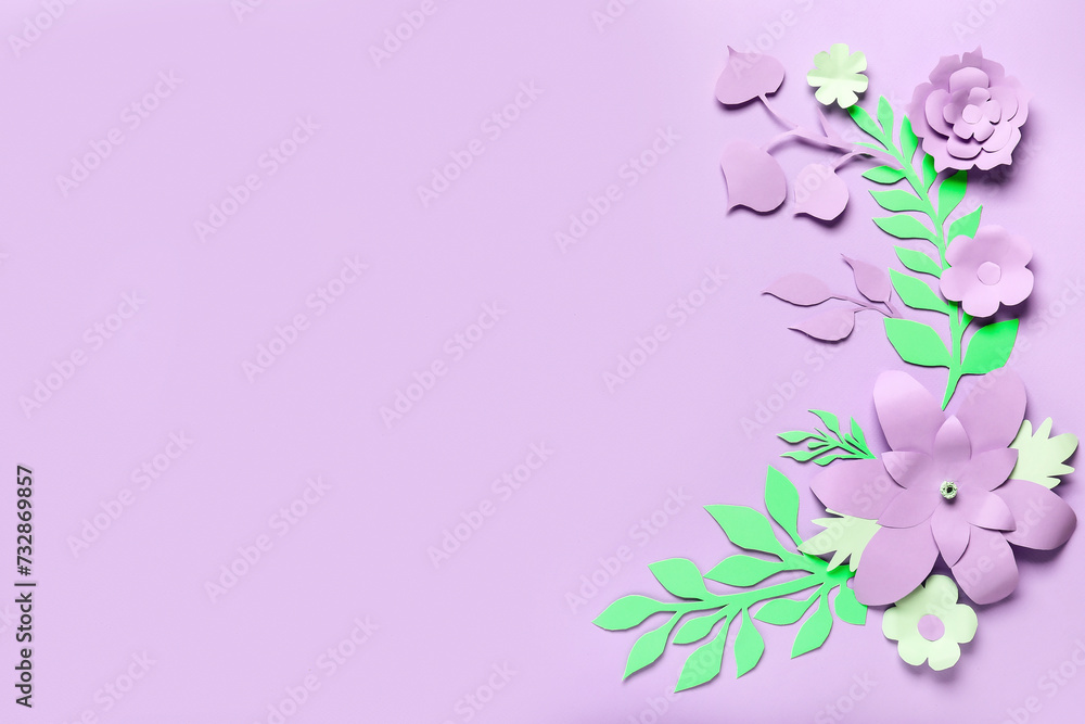 Frame made of paper flowers with leaves on purple background