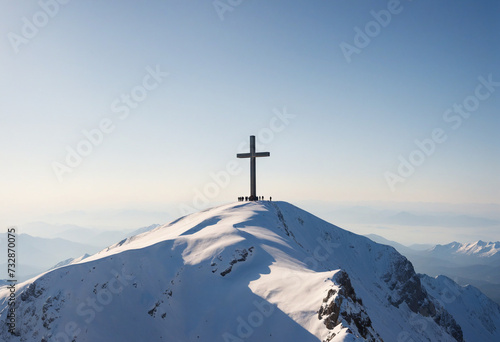 Symbol of faith on snowy peak