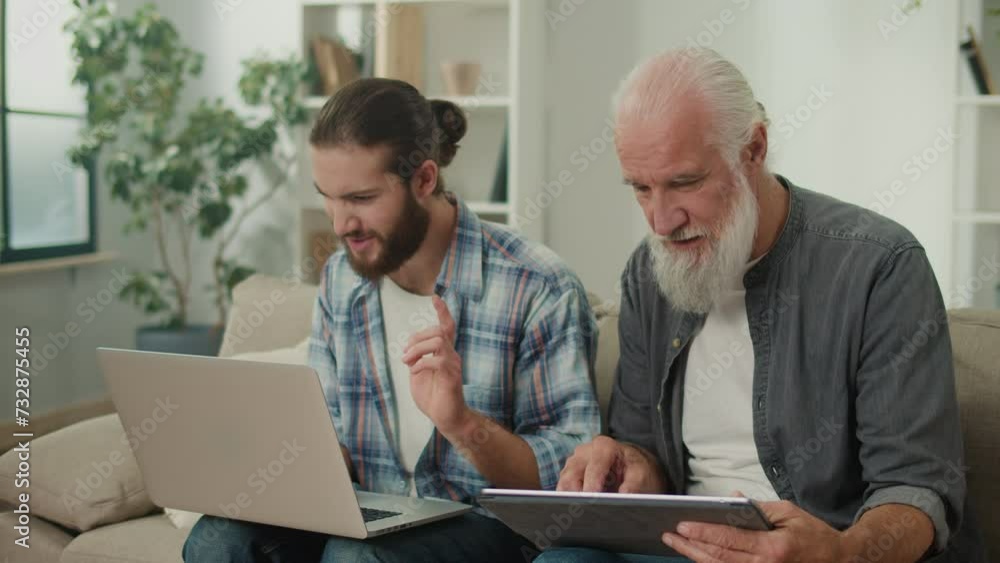 Young volunteer teaches senior how to use a tablet, bridging generation gap, tech-savvy youth, elderly learning, digital literacy, cross-age friendship, modern gadgets Young volunteer teaches senior how to use a tablet, bridging generation gap, tech-savvy youth, elderly learning, digital literacy, cross-age friendship, modern gadgets