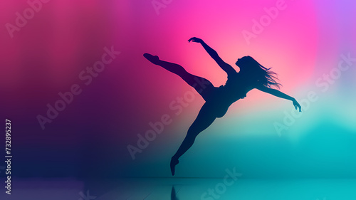 Silhouette of a Dancer Leaping Gracefully Against a Vibrant Backdrop