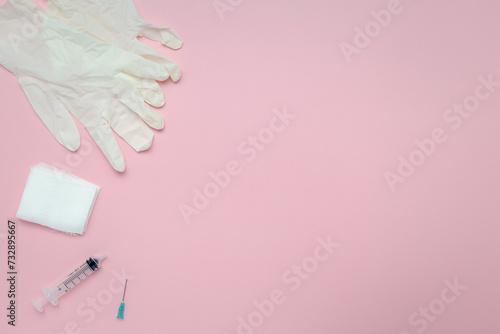 Flat lay of syringes, gauze...