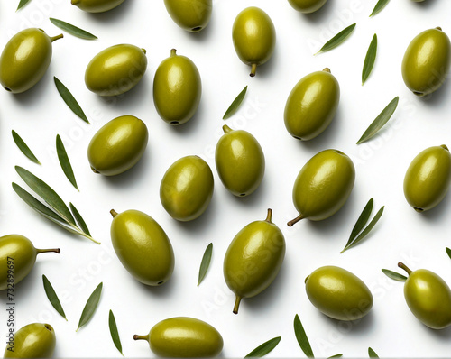 green olives and olives leaves composition on white background