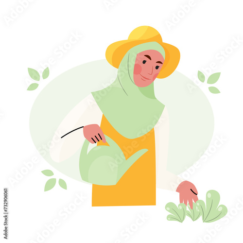 Muslim woman water plants in garden
