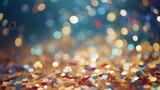 Closeup of confetti on a glittering background