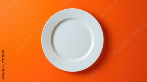 Top-down view of a white empty plate placed on a vibrant orange background  creating a striking contrast  Ai Generated.