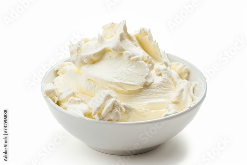 Closeup view of a bowl of cream cheese isolated on white background