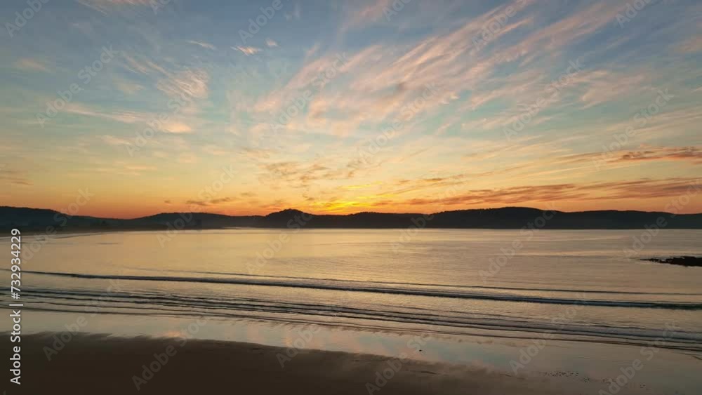 High cloud sunrise seascape at Umina Point in Umina Beach on the Central Coast, NSW, Australia. High cloud sunrise seascape at Umina Point in Umina Beach on the Central Coast, NSW, Australia.