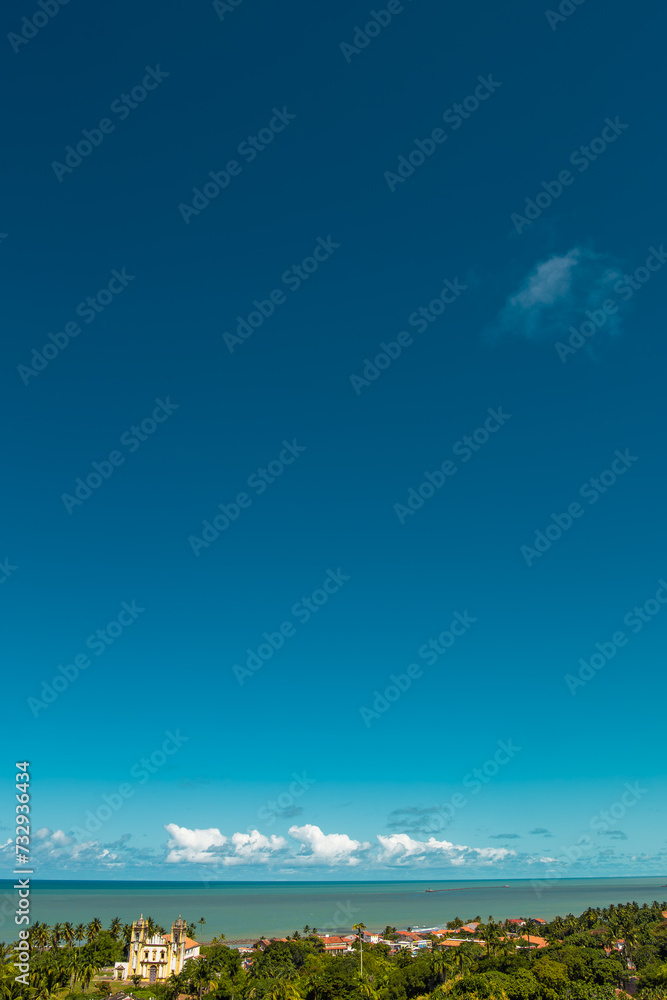 Vertical photo of the cities of Olinda and Recife with the Carmo Church, Marco Zero and buildings in the capital of Pernambuco