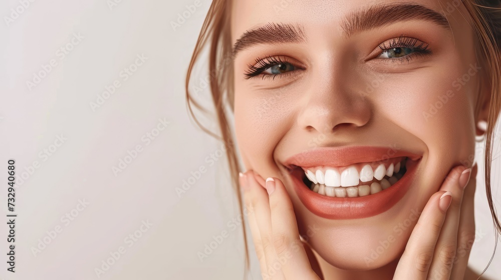 With a radiant smile, the girl showcases her stunning, perfectly-aligned teeth, exuding happiness and confidence. With a radiant smile, the girl showcases her stunning, perfectly-aligned teeth, exuding happiness and confidence.