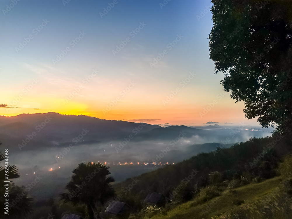 Sunrise landscape of Chongchang mountain viewpoint,located in Nasarn town,Suratthani,Thailand Sunrise landscape of Chongchang mountain viewpoint,located in Nasarn town,Suratthani,Thailand