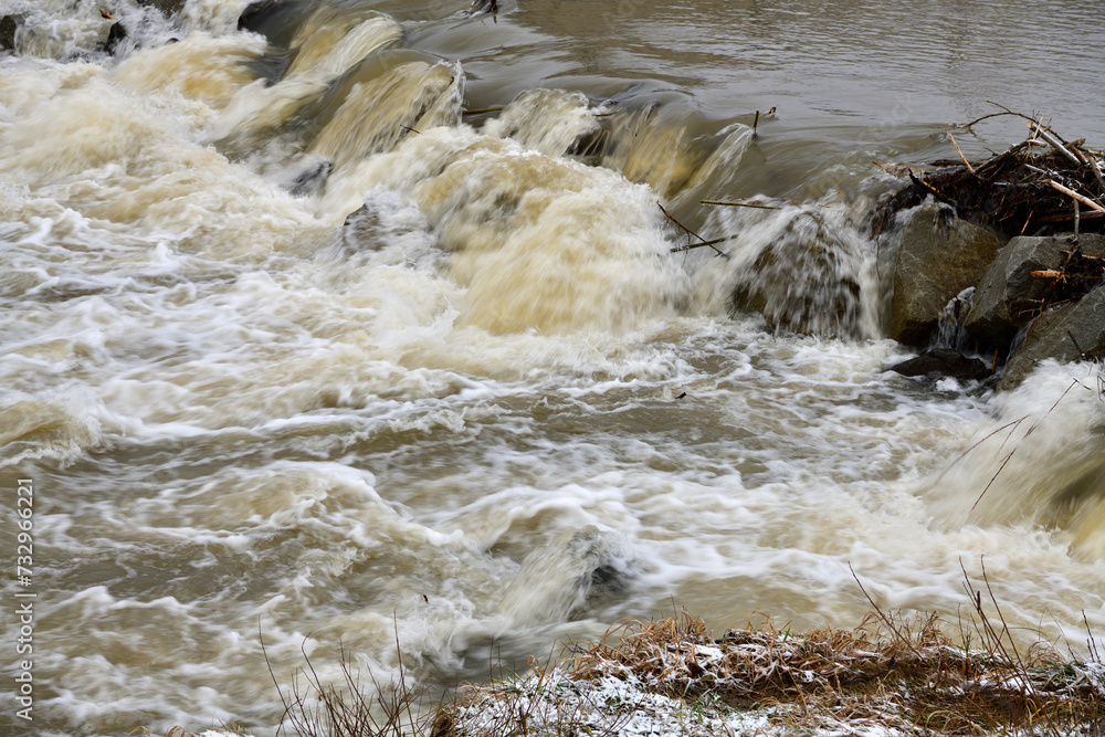Long exposure of milky blurred view of flowing river in autumn