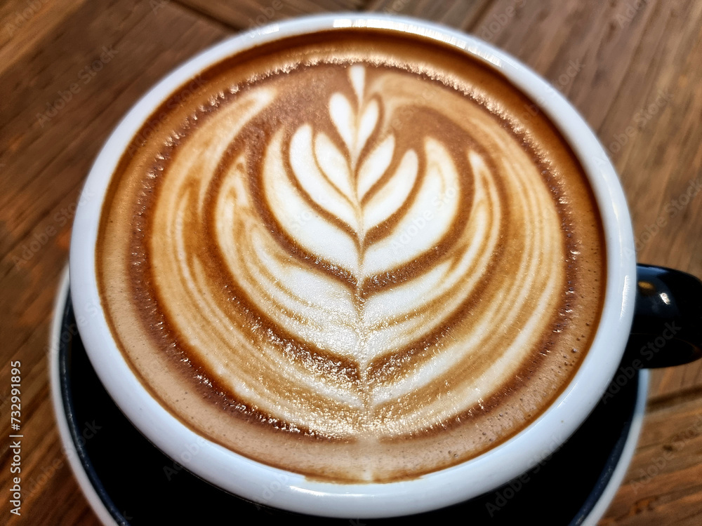Sideway shop coffee, close-up hot latte art coffee background. Sideway shop coffee, close-up hot latte art coffee background.