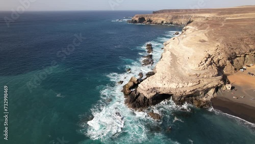 Fuerteventura, Canary islands. Coastline and beach in a tourist town. photo