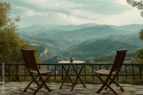 Chairs lined up gracefully, inviting spectators to savor the tranquil morning atmosphere against a majestic mountain backdrop. © Murda