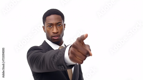 Serious african american businessman pointing at camera, isolated on white