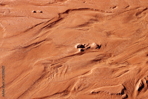 Red earth, dark red sand texture on the ground