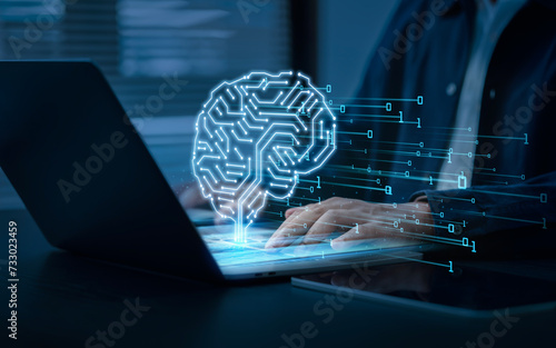Artificial intelligence (AI) brain image with circuit board lines inside. Businessman analyzes data using AI, modern computer technology. Big data analysis with artificial intelligence