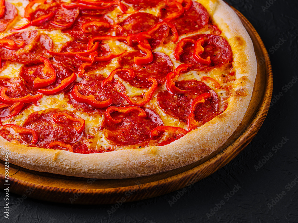 tasty pepperoni pizza with red bell peper