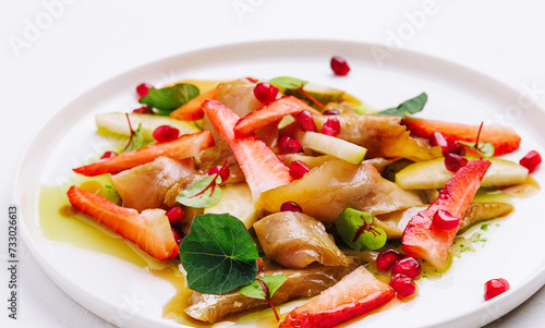 fish with strawberries, pears and pomegranates in sauce