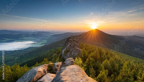 the top of prad d mountain in the czech republic during sunrise photo