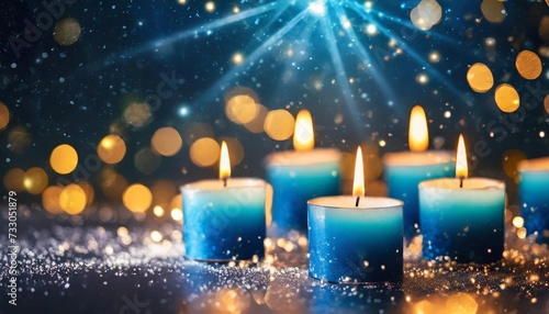 flaming blue candles at night on dark background with stars and lights candles in christian church as catholic symbol abstract festive backdrop christmas eve or chanukah banner with copy space