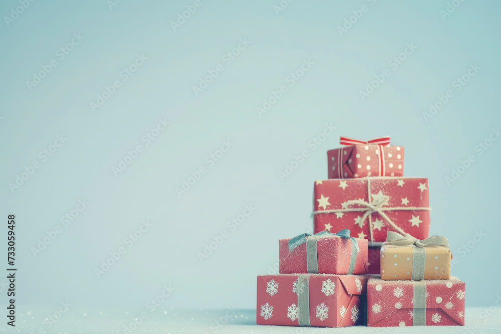 Collection of present boxes on a light blue background.