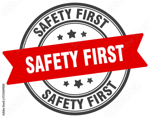 safety first stamp. safety first label on transparent background. round sign