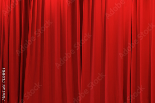 red theater curtain that dropped down as a straight line.  Background for inserting text, empty spaces.	
