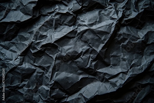 Vintage Black Crumpled Paper Texture Background with Rough Textured Grunge Effect