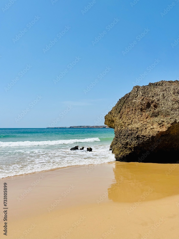 rocky coast of the ocean, rocks at the ocean beach, ocean horizon