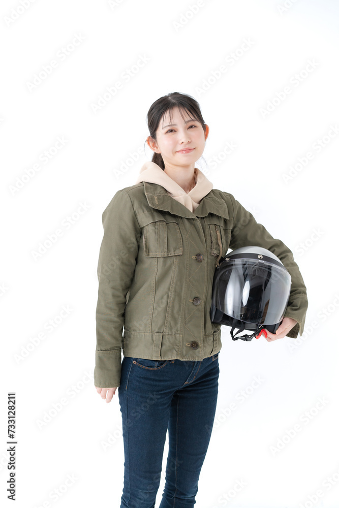 ヘルメットを持った女性 ヘルメットを持った女性