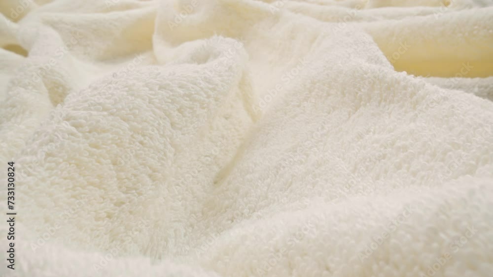 Beige cotton towel. Macro shooting of textile. Camera slide over beige cotton material. Dolly shot with laowa probe lens. Close-up in 4K, UHD Beige cotton towel. Macro shooting of textile. Camera slide over beige cotton material. Dolly shot with laowa probe lens. Close-up in 4K, UHD