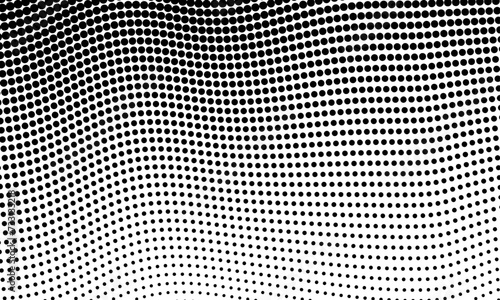 Halftone dotted texture grunge background. Abstract black and white halftone dotted background.