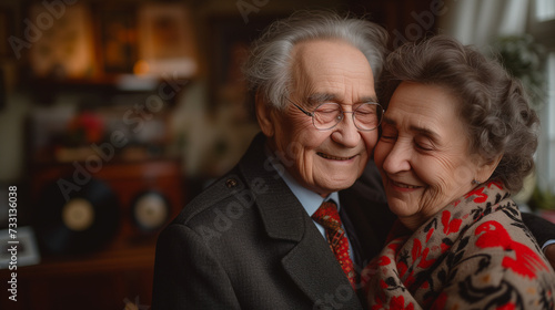 Elderly couple embracing, peaceful old age