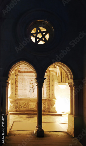 The entrance to the monastery is a symbol of purity and innocence. Contrast light and dark. Catholic church.